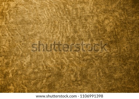 Gold textile texture with interference. Backdrop for creative projects.