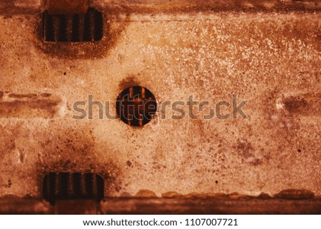 Horizontal metallic brown texture. Background of auto part close-up. Metal surface in macro.