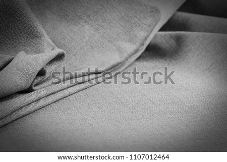 crumpled fabric background and texture. Abstract background, empty template. Selective focus.