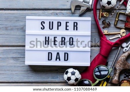 Super hero dad, Father's Day lightbox message. Overhead view