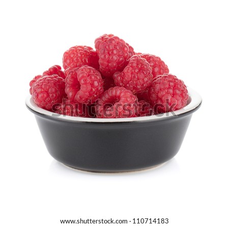 Ripe raspberry small bowl. Isolated on white background