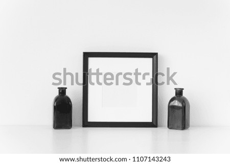 Minimal black square frame mockup . Mock up for your photo, design or text.