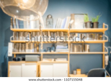 Abstract blurred and defocused bookshelf for background usage