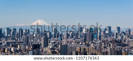 Tokyo city view , Tokyo downtown building and Tokyo tower landmark with Mountain Fuji on a clear day. Tokyo Metropolis is the capital of Japan and one of its 47 prefectures. Royalty-Free Stock Photo #1107176363