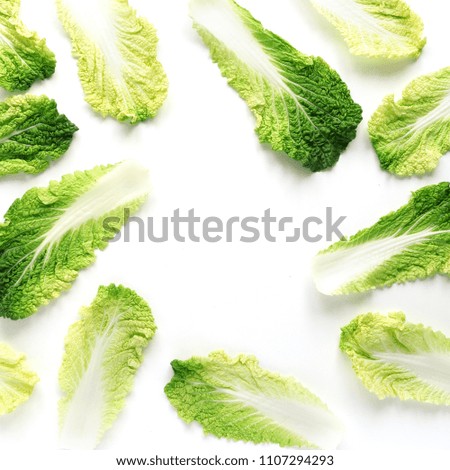 Frame composition of the leaves of Peking cabbage, creative flat layout, top view. The concept of healthy food.