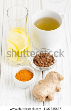 Super foods, turmeric, ginger, lemon, flax seeds, green tea