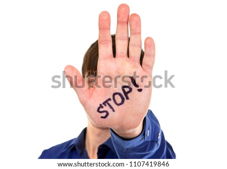 Person shows the Stop Palm Gesture on the White Background