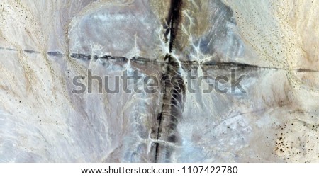 Desert Cross, tribute to Tapies, abstract photography of the deserts of Africa from the air. aerial view of desert landscapes, Genre: Abstract Naturalism, from the abstract to the figurative,