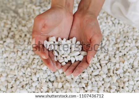 Hands of child holding a heart of… Stock Photo 1348620929 - Avopix.com