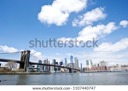 new york city skyline with brooklyn bridge