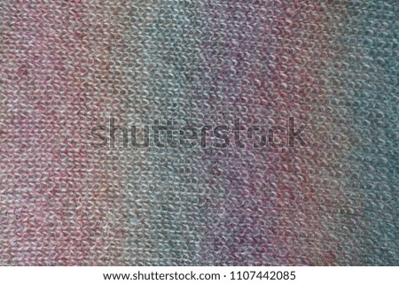 Bright colorful handmade knitted fabric from above