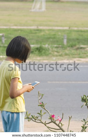 Teenage girls with smartphones