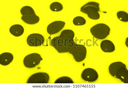 Bright textural background. Futuristic acrylic abstraction. Colored drops of paint.