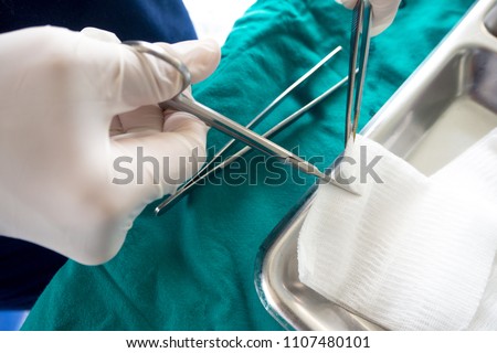 Wound care dressing set on stainless steel plate Royalty-Free Stock Photo #1107480101