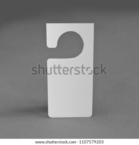 White door hanger on a gray background