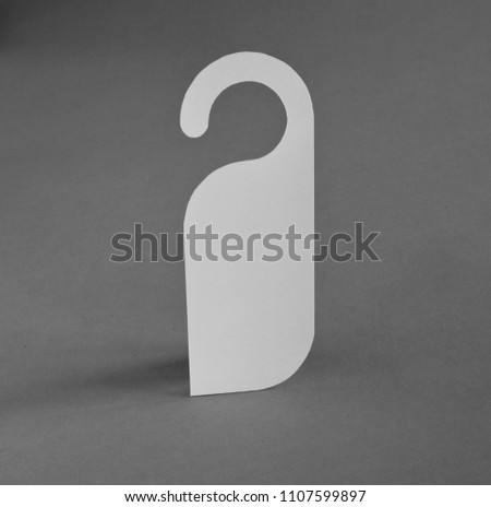 White door hanger on a gray background