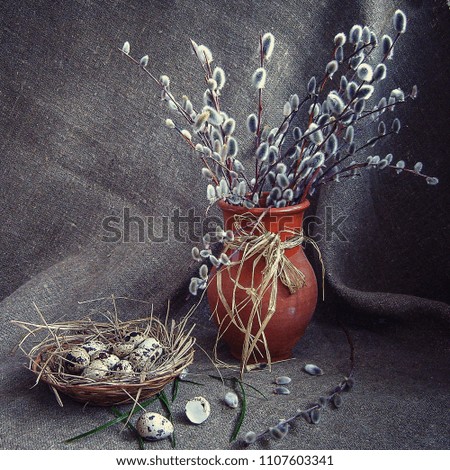 Spring still life with eggs and willow branches