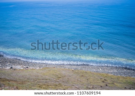 beautiful blue ocean with beach and blue sky , white cloud in Taiwan
