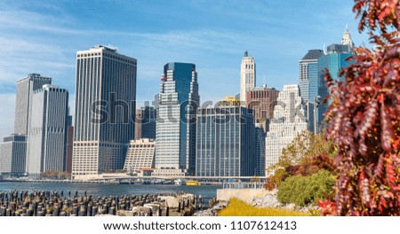 Manhattan skyline view from Brooklyn Bridge Park in autumn, New York City.