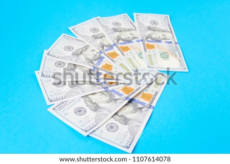 dollars on a blue background