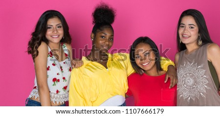 Group of young teen female friends spending time together