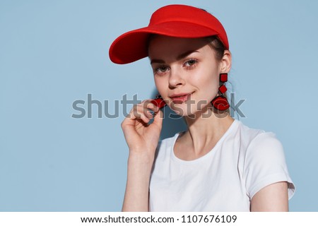   woman in a red cap                             