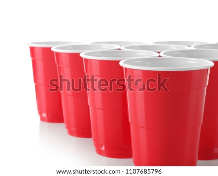 Cups for beer pong on white background