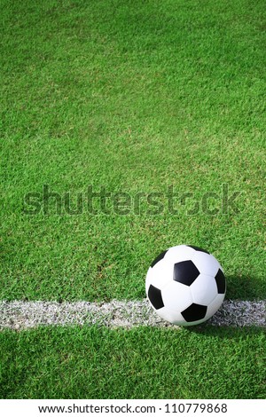 soccer ball on white line.