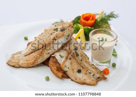 Fish steak with potatoes