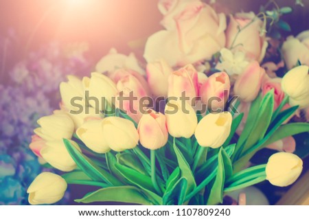 A beautiful bouquet of tulips. Festive decorations. A toned picture in the style of instagram.