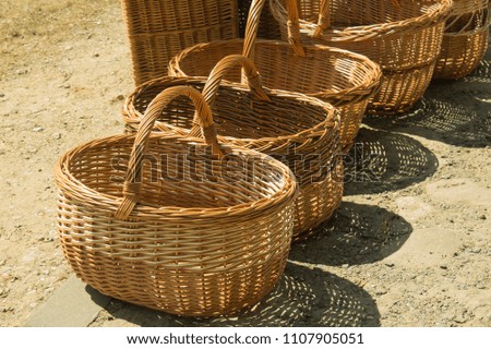Many baskets are on the market. The background is slightly blurred.