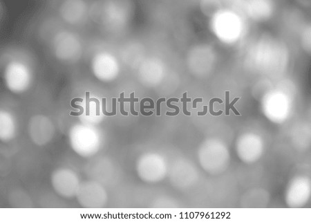 Blurred image of silver chandelier or suspended ceiling lamp.