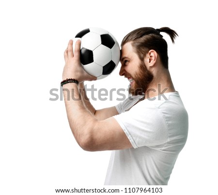 Soccer fan man hold ball celebrating happy laughing shouting screaming out loud  in cap isolated on white background