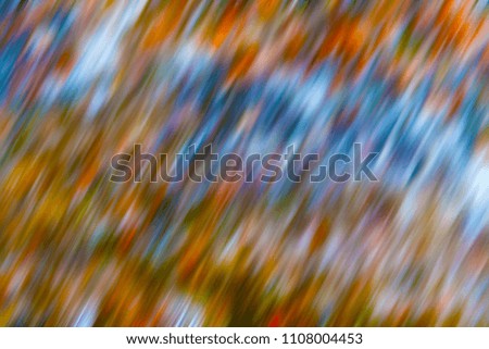 photo in motion, rain nature, blurred multicolored background