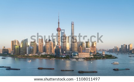shanghai skyline in the setting sun after glow, China