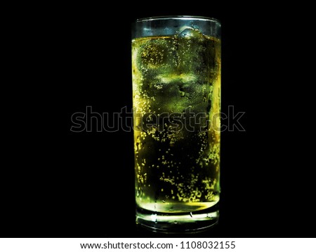 scotch whisky water in a glass with black background