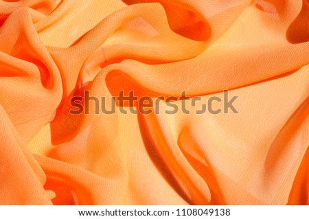 Background texture pattern. Silk crepe of chiffon peach peachpuff Introducing the sultry and stunning  Silk Satin you see here. Duchess satin is a gorgeous high-fiber count medium-bodied low luster