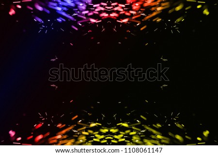 Colorful Bokeh lights on black background, shot of flying fire sparks in the air, Firestorm texture.