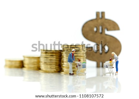 Miniature people : Family Mother, Father and children go shopping with stack of coins and dollar sign icon,spending money for supermarket goods concept