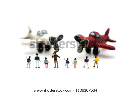 Miniature people : student and children with airplane,education and fun travel concept.