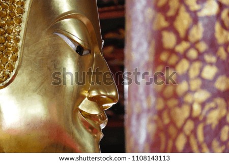 Buddha image golden portrait close up,Nan,Thailand