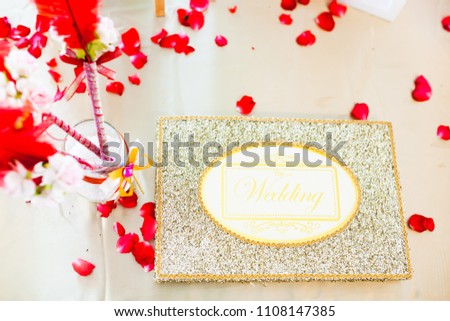 Hand writing wedding notebook for well wishers.