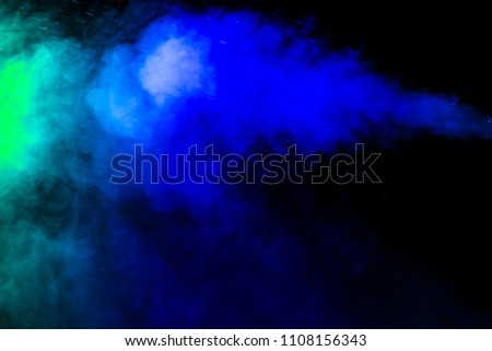 Colored smoke on black  background