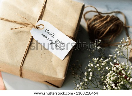 Gift box with a phrase will you marry me?