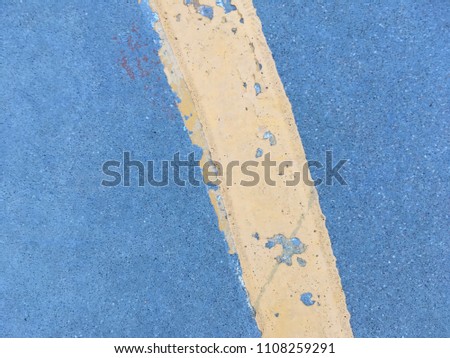 Yellow line paint on floor for texture and background