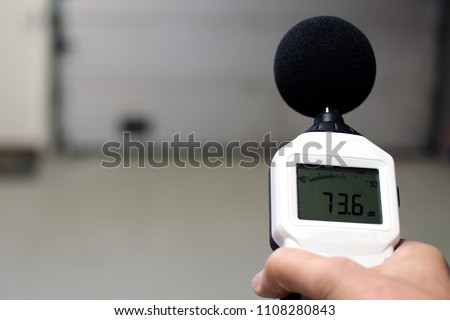 Sound level meter measuring the noise. Space for text. Royalty-Free Stock Photo #1108280843