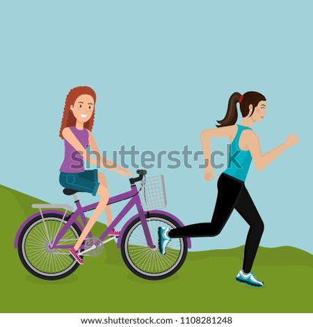 women with bicycle in the landscape