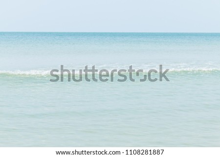 Calm blue sea with waves seen nature background