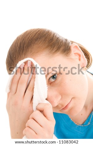 The young woman with the towel isolated on a white background