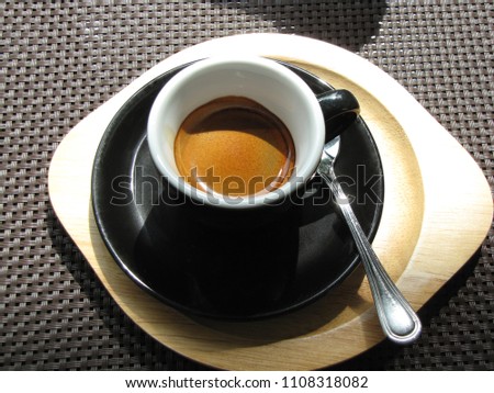  Coffee in Mug Black on table
